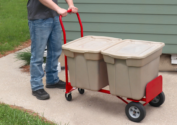 Moving storage containers with hand truck